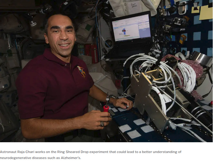 Research in Low Earth Orbit showing an astronaut working with the Ring-Sheared Drop experiment aboard the International Space Station.